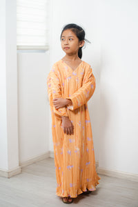 Melrose Label: All Heals Pleated Girl Dress in Marigold