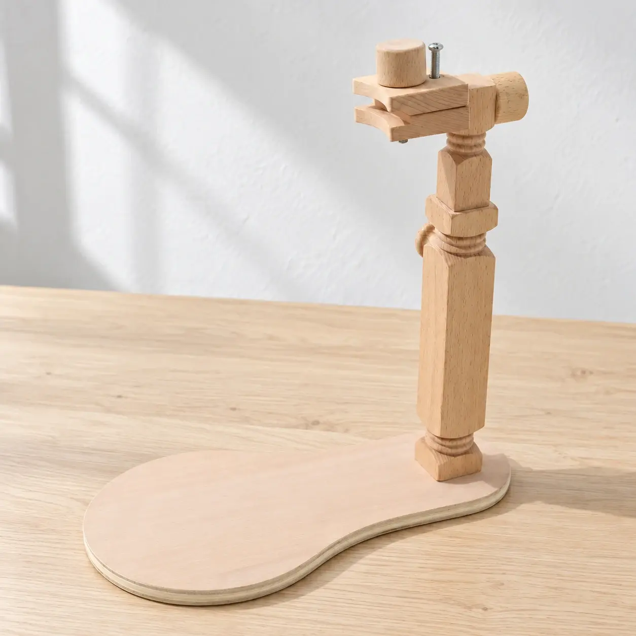 Wooden embroidery stand with its empty adjustable clamp